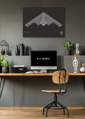 Minimalist artwork of the B-2 Spirit, featuring bold graphic lines and Morse code typography. Available in metallic silver ink or gloss varnish for a stealth effect on black Plike paper, displayed unframed in a modern home office setting.