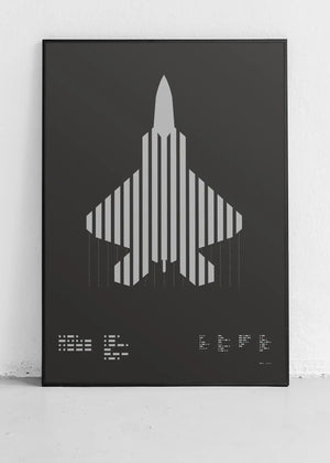 Framed minimalist artwork of the F-22 Raptor, featuring bold graphic lines and Morse code typography. Screenprinted in metallic silver ink, displayed in a modern home office setting.