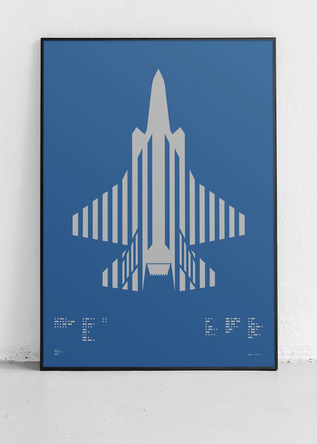 Minimalist artwork of the F-35 Lightning II, featuring bold graphic lines and Morse code typography. Screenprinted in metallic silver ink on premium Plike paper, displayed unframed in a modern home office setting.