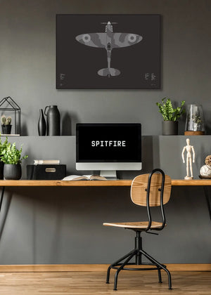 Minimalist artwork of the Spitfire aircraft, featuring bold graphic lines and Morse code typography. Screenprinted in metallic silver ink on premium Plike paper, displayed unframed in a modern home office setting.