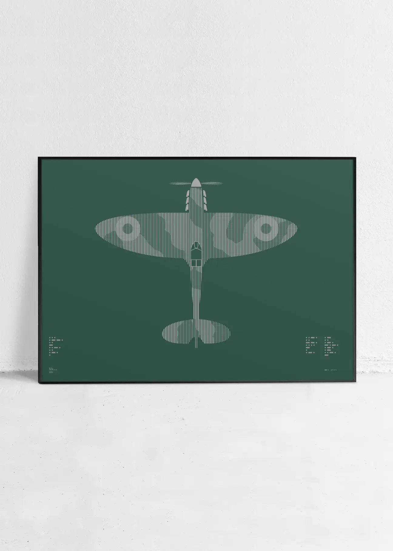 Minimalist artwork of the Spitfire aircraft, featuring bold graphic lines and Morse code typography. Screenprinted in metallic silver ink on premium Plike paper, displayed unframed in a modern home office setting.
