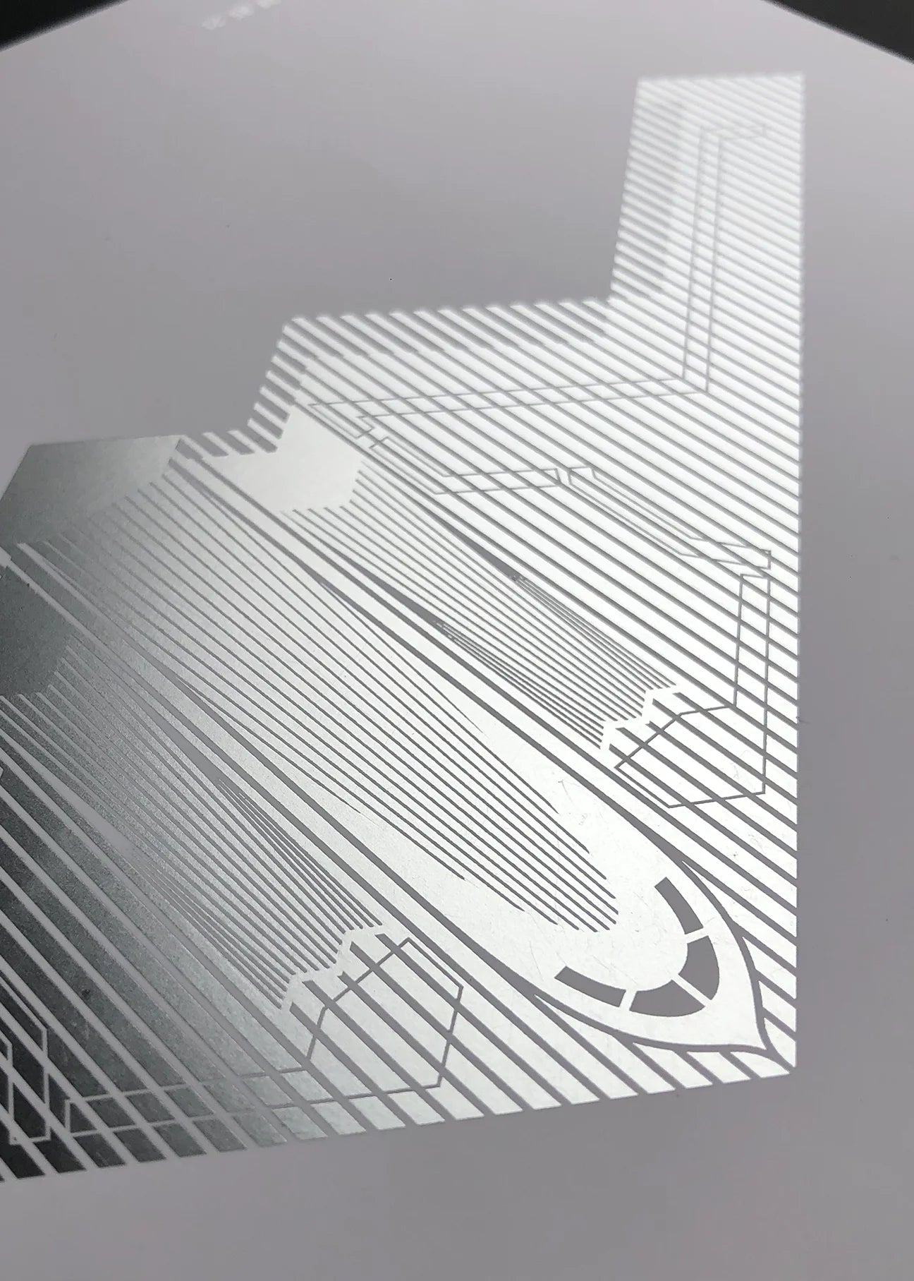 Digital foil aircraft print of the B-2 Spirit stealth bomber, rendered in matt silver foil on white digital paper, with bold aerodynamic lines. Frame not included.