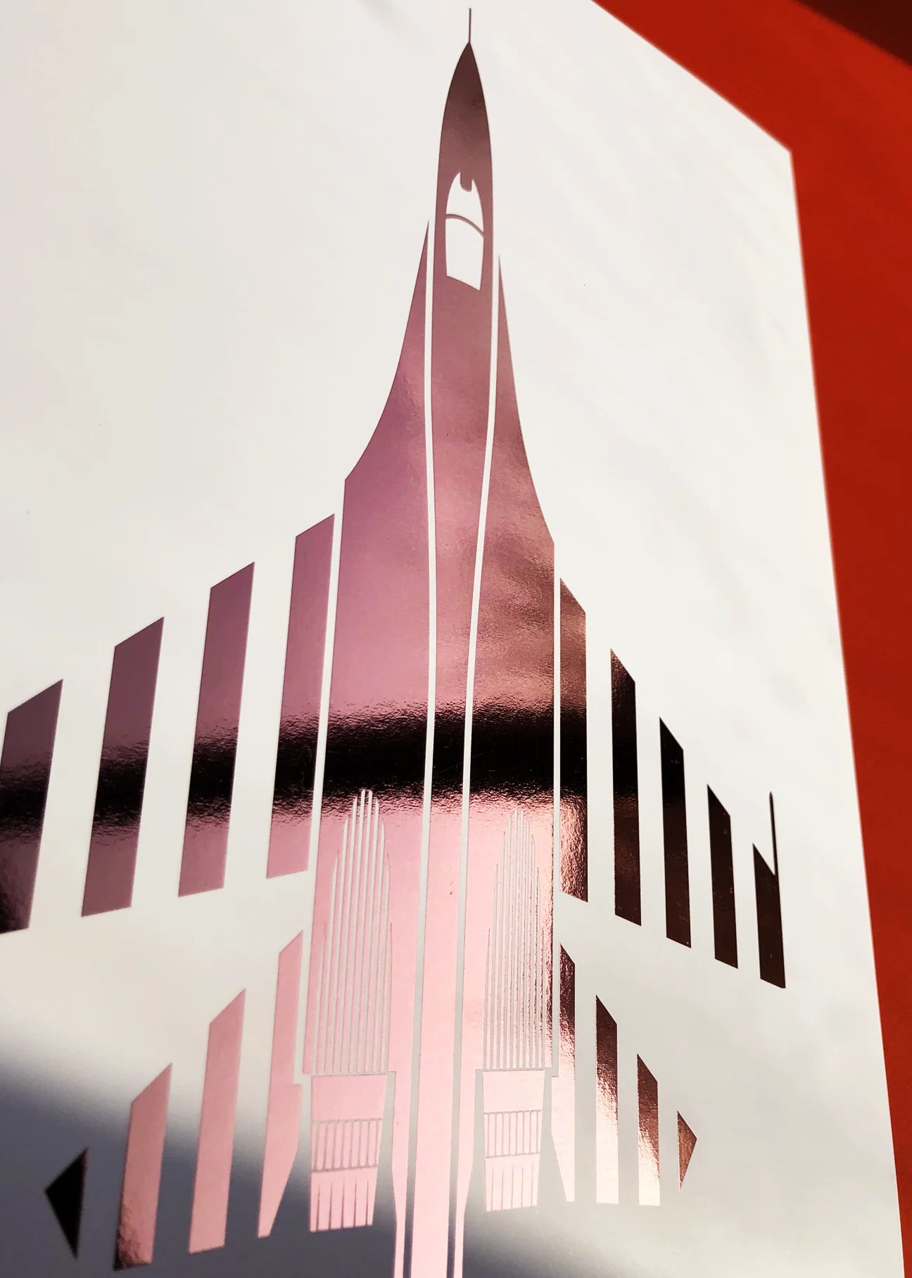 Digital foil aircraft print of the Su-27 Flanker air superiority fighter, rendered in rose gold foil on white digital paper, with bold aerodynamic lines. Frame not included.