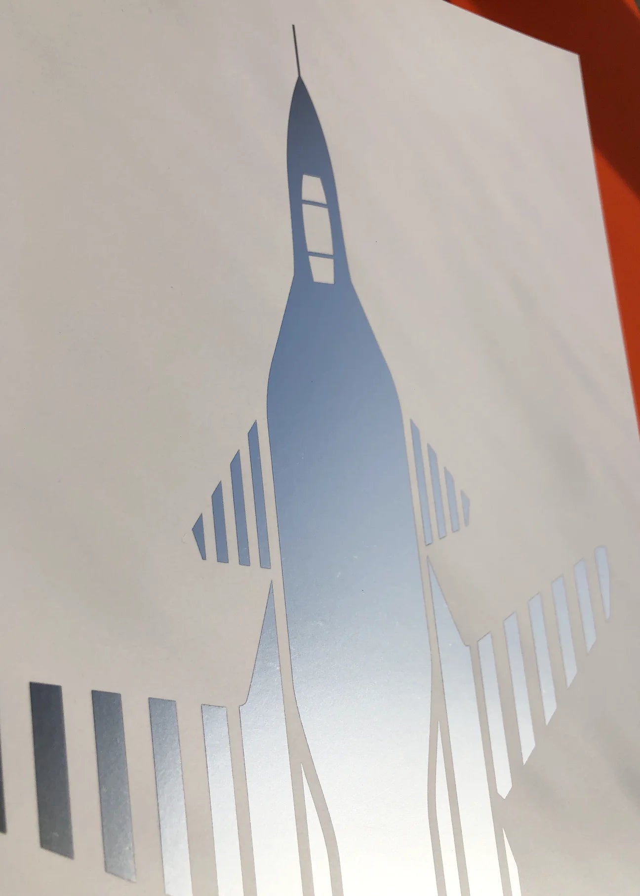 Digital foil aircraft print of the Su-47 Berkut fighter jet, rendered in matt silver foil on white digital paper, showcasing its futuristic forward-swept wings. Frame not included.