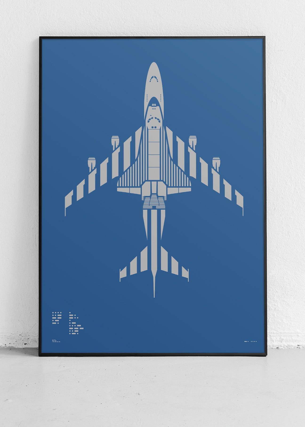 Minimalist artwork of NASA 905 Shuttle Carrier Aircraft, featuring bold graphic lines and Morse code typography. Screenprinted using metallic silver ink on premium Plike paper, displayed unframed in a modern home office setting.